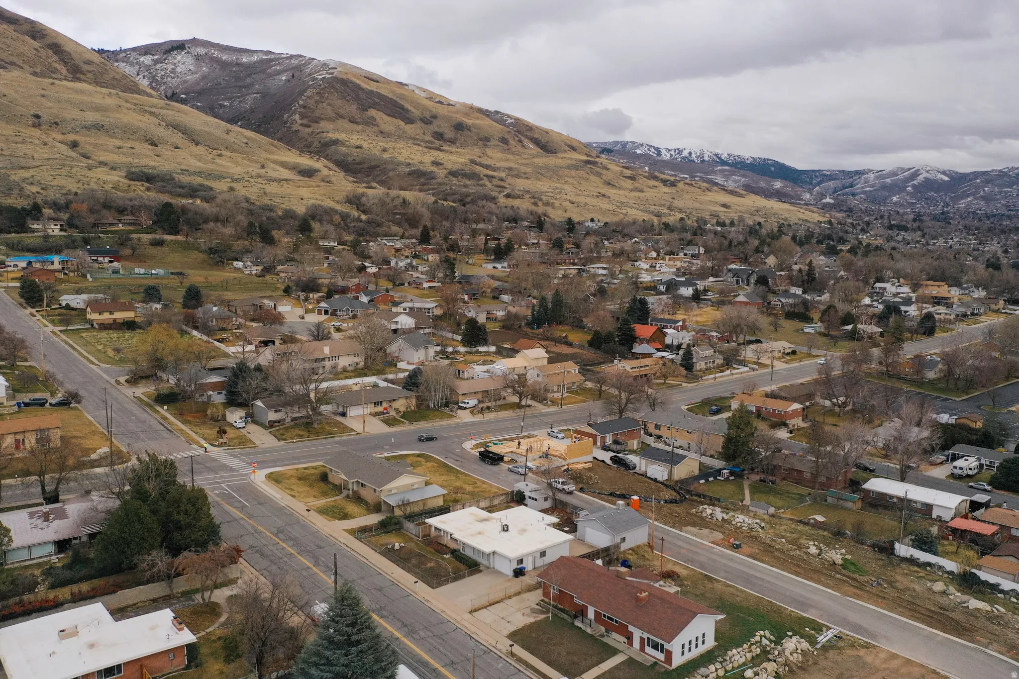 Aerial perspective of suburban area featuring mountains