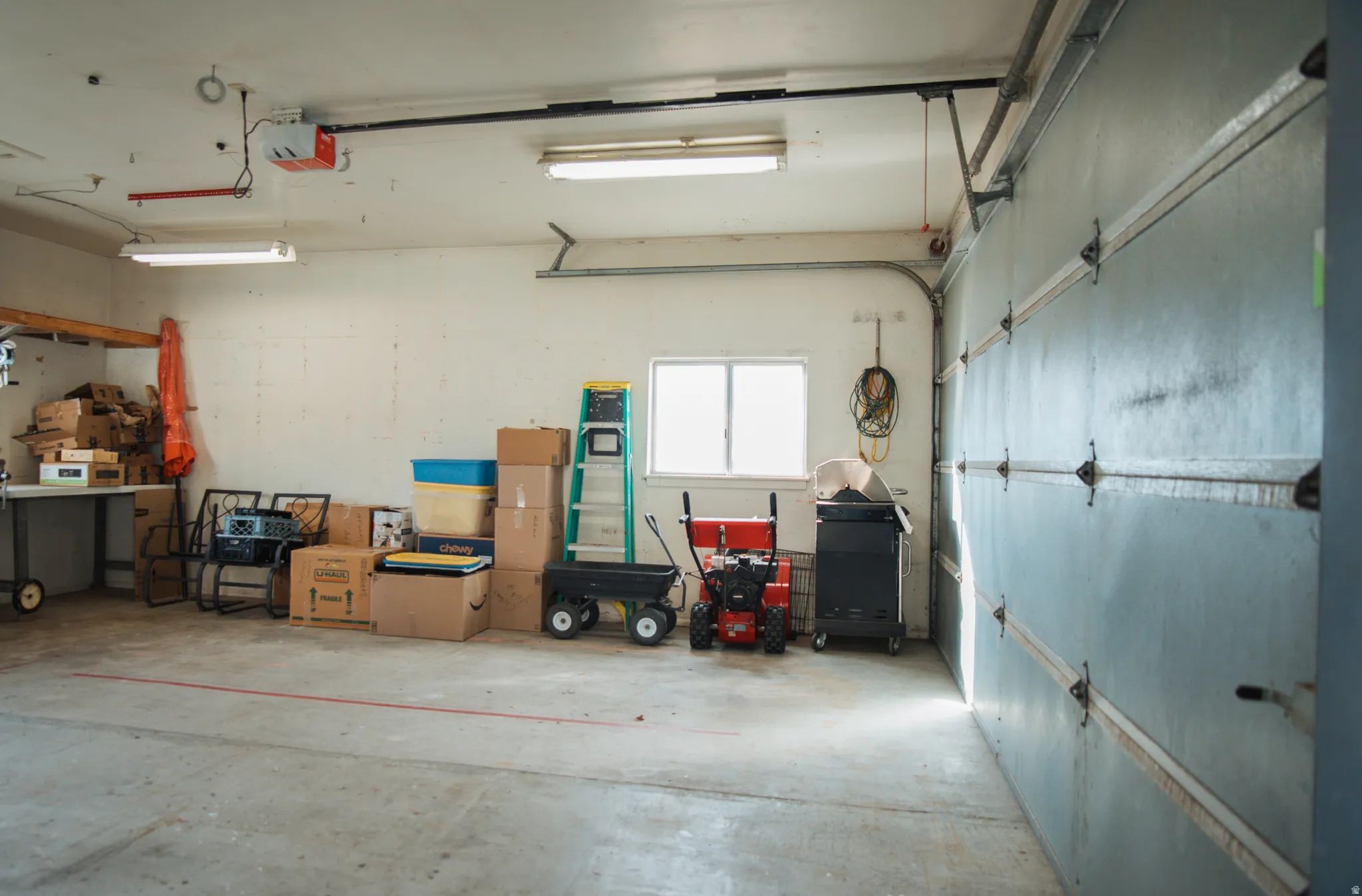 two-car garage with a garage door opener