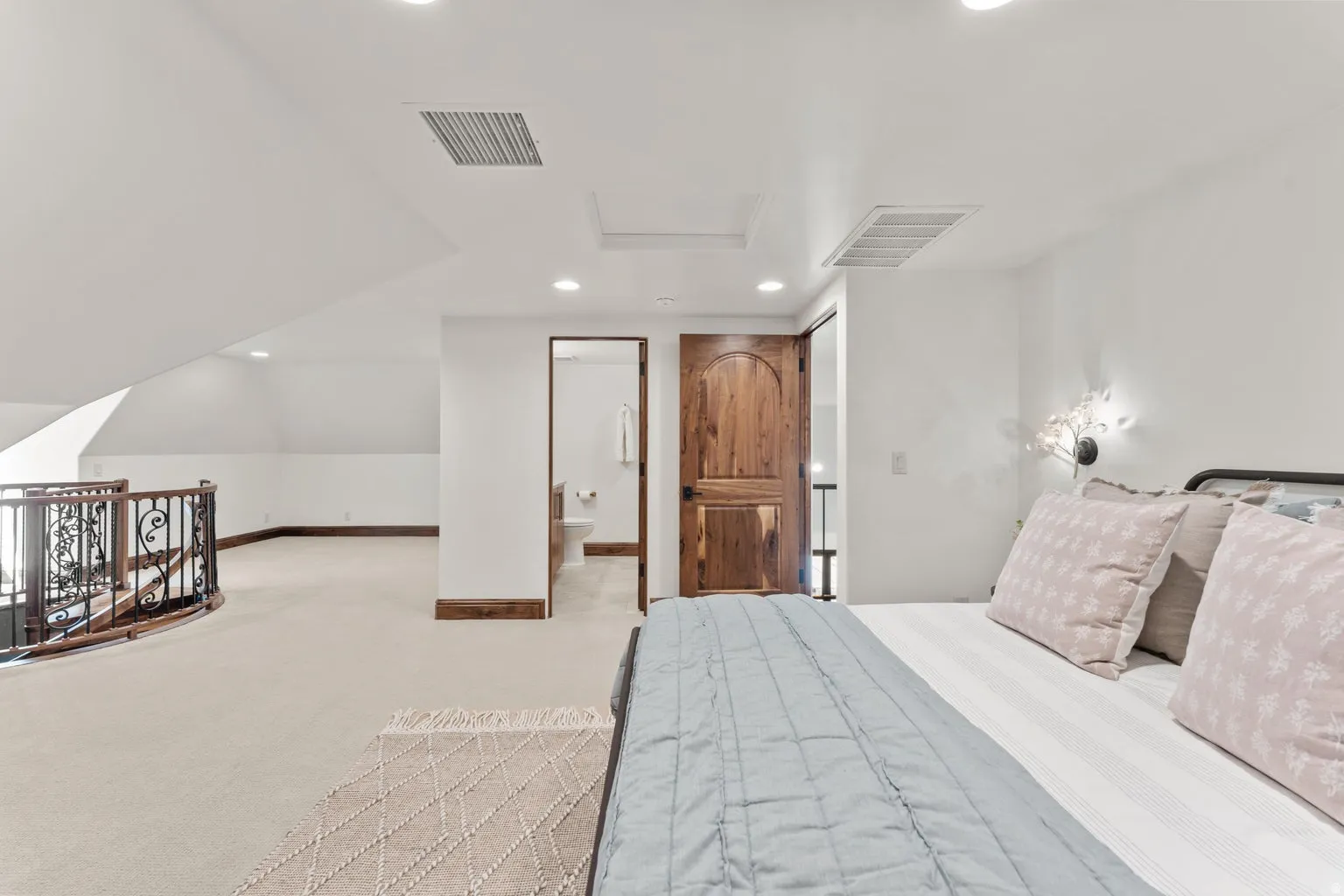 2nd Level Bedroom featuring recessed lighting, light carpet, and ensuite bathroom