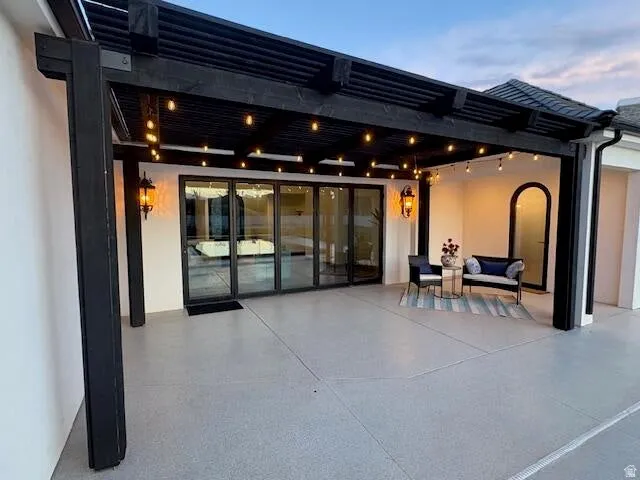 View of patio with a pergola