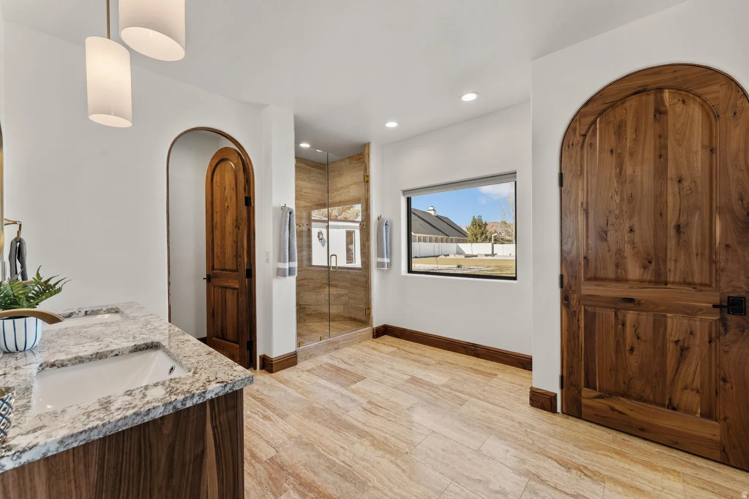 2nd Primary Owner Suite Bathroom with a stall shower, double vanity, recessed lighting, and light wood-style floors