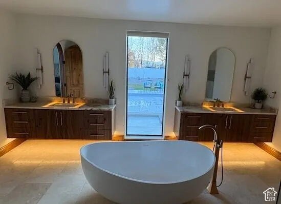 Walnut Cabinets featuring light countertops, modern cabinets, and dark wood finish cabinetry