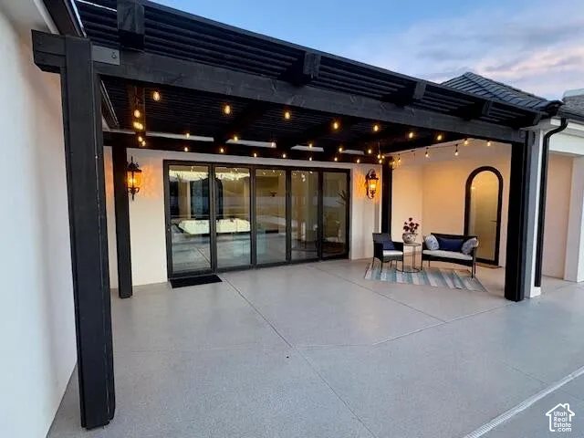 View of patio with a pergola