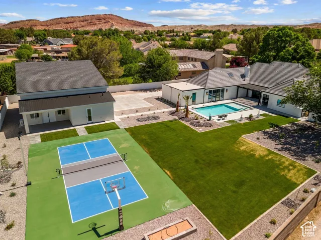 Drone / aerial view of a pool area and mountains