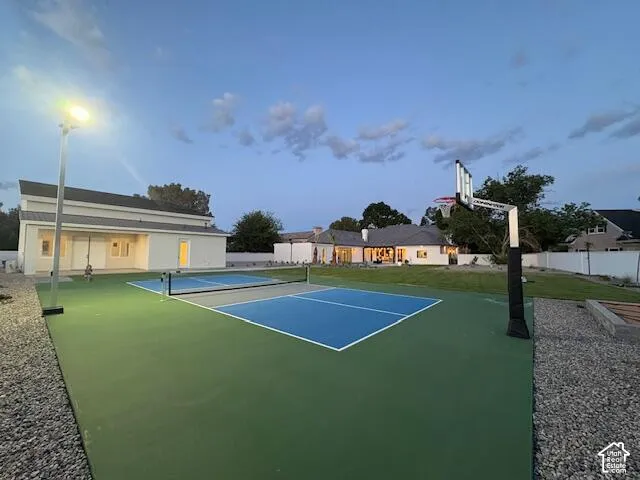 View of pickleball court with a patio area