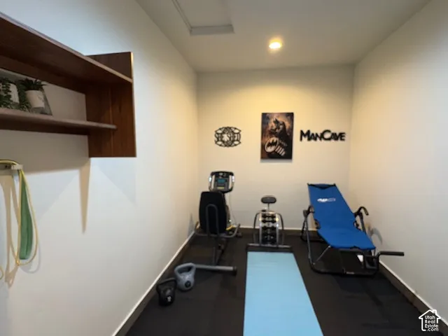 Exercise area with recessed lighting and rubber floors
