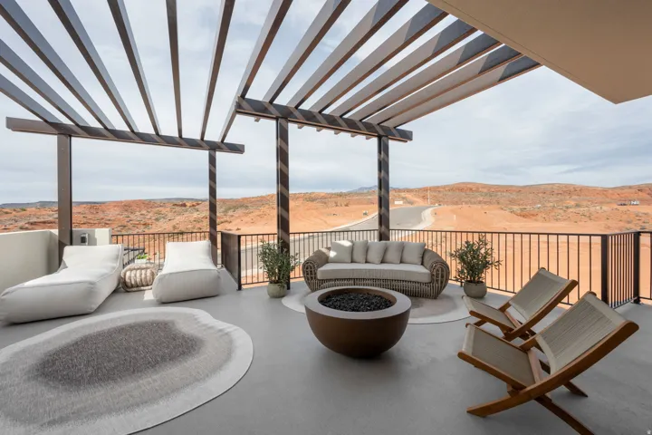 View of patio / terrace with a mountain view and an outdoor living space with a fire pit