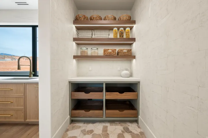 Detailed view of a sink and wood finished floors
