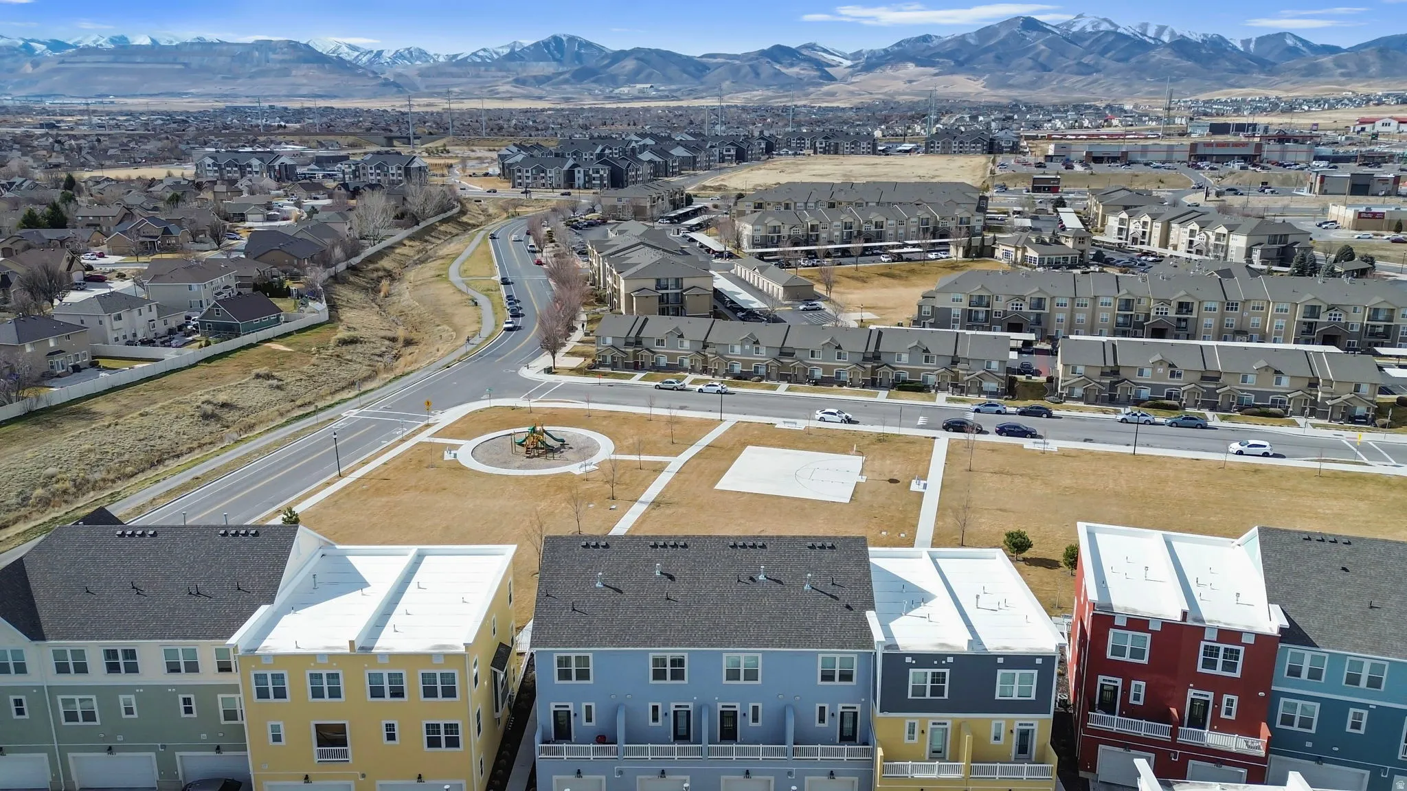 Aerial view of residential area with a mountainous background