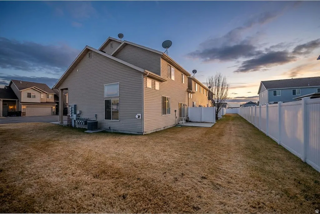 Rear view of house with a patio