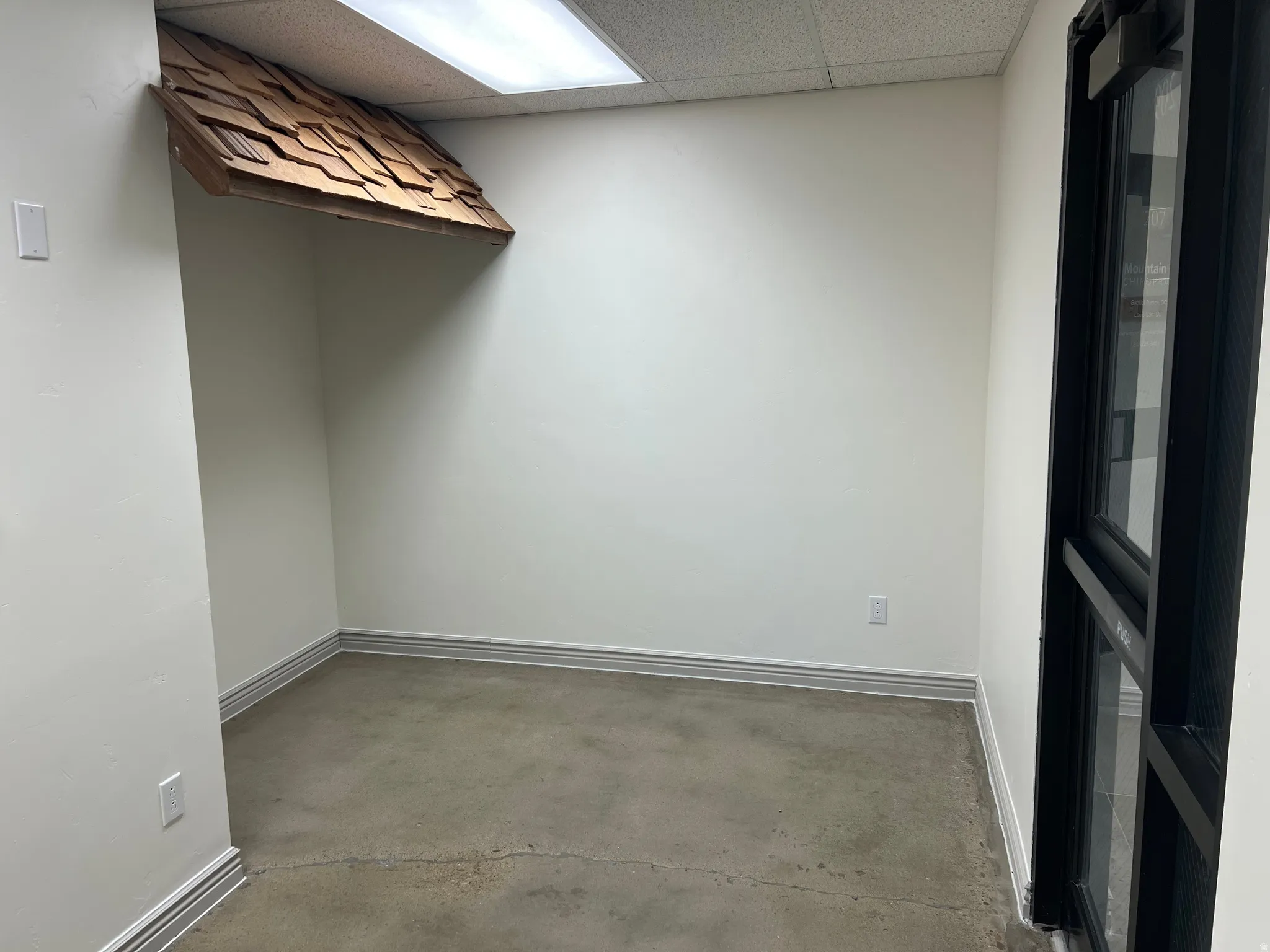 Walk in closet featuring a drop ceiling