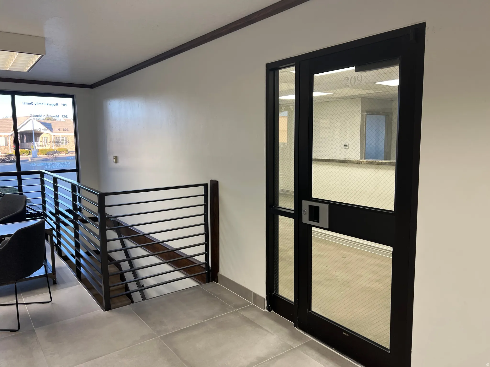 Stairs featuring ornamental molding and baseboards