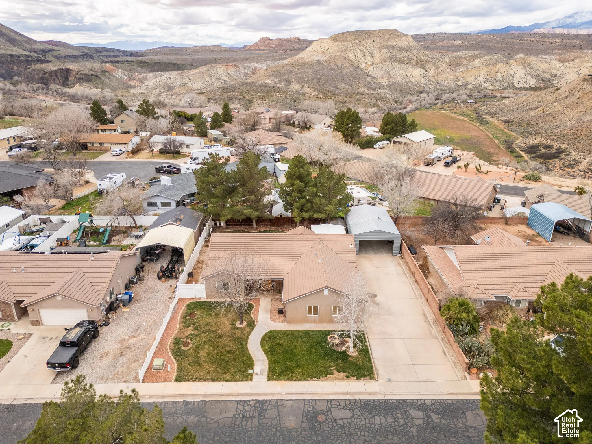 Aerial view of residential area with a mountain backdrop