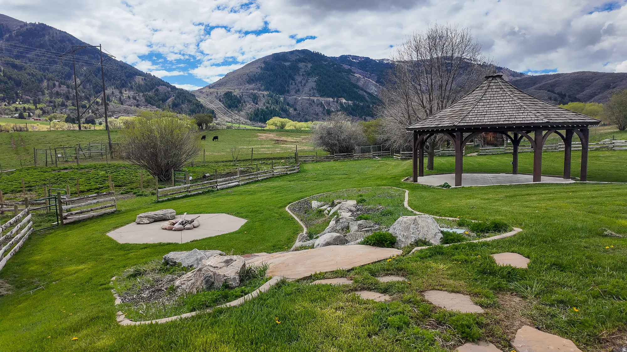 View of mountain background featuring rural landscape