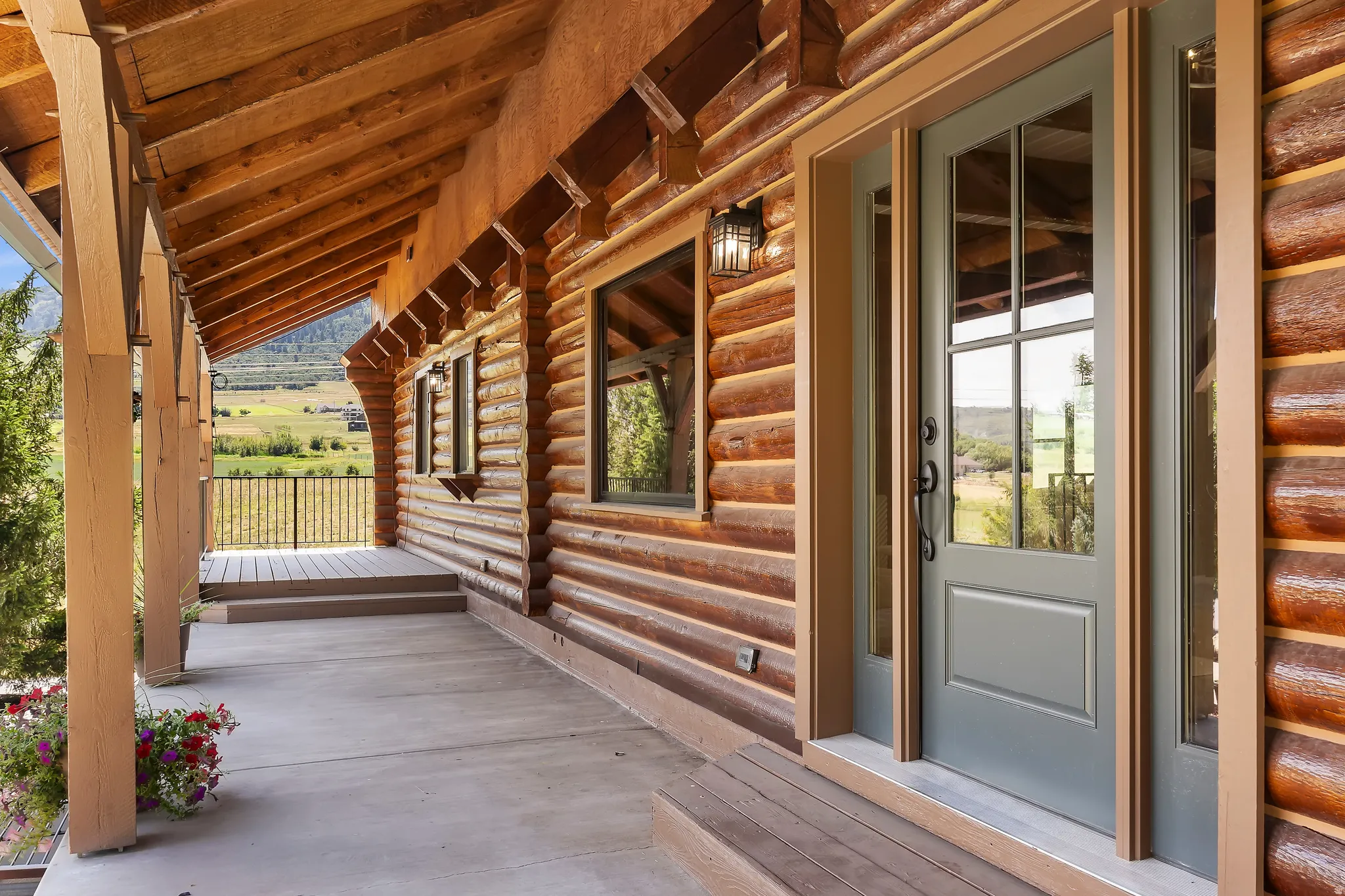 View of patio featuring a wooden deck