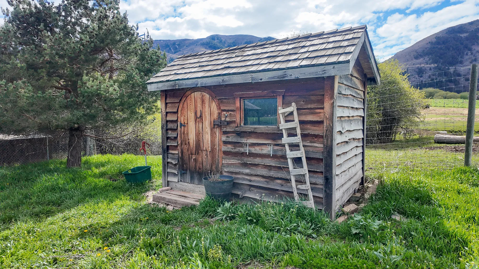 View of shed with a mountain view