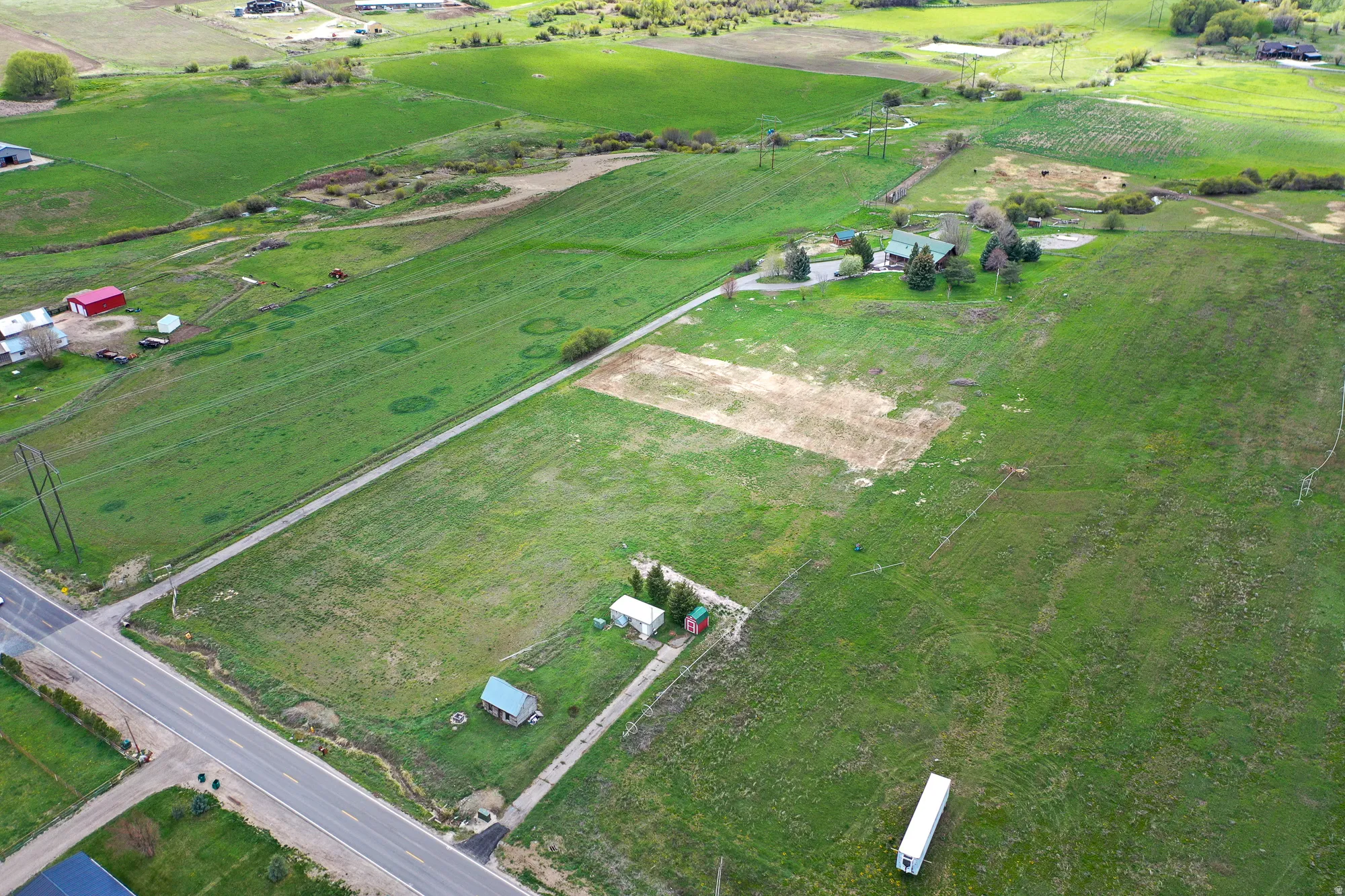 Overview of rural landscape with rows of crops
