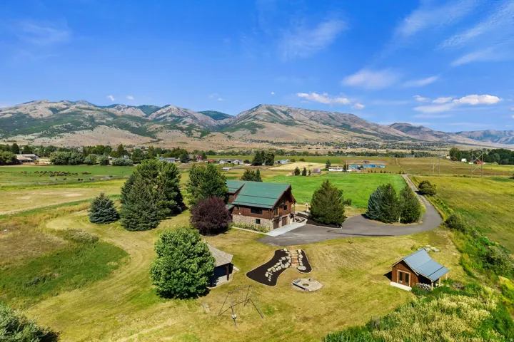View of rural area with a mountainous background and a pastoral area