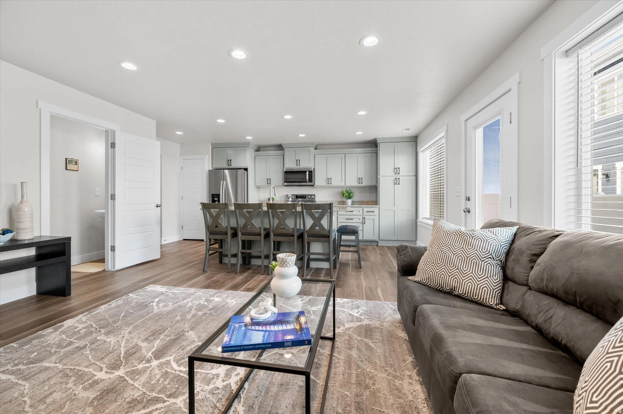 Living area featuring recessed lighting and wood finished floors