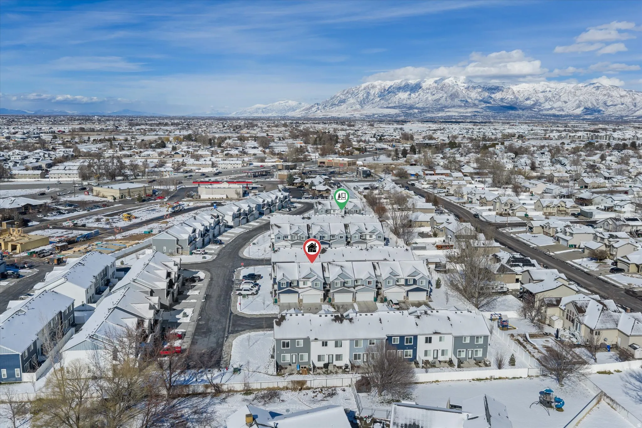 Snowy aerial view with a mountain view