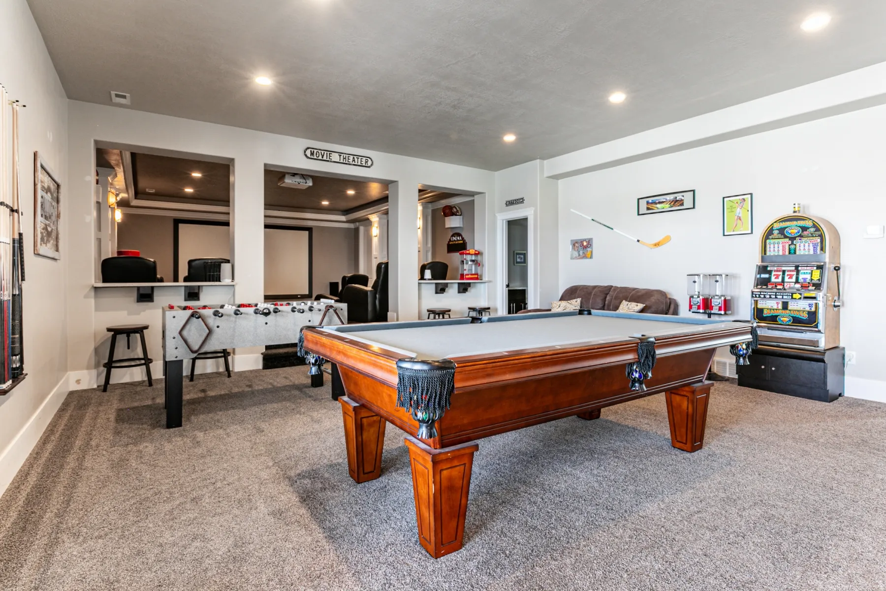 Recreation room with light carpet, billiards table, and recessed lighting