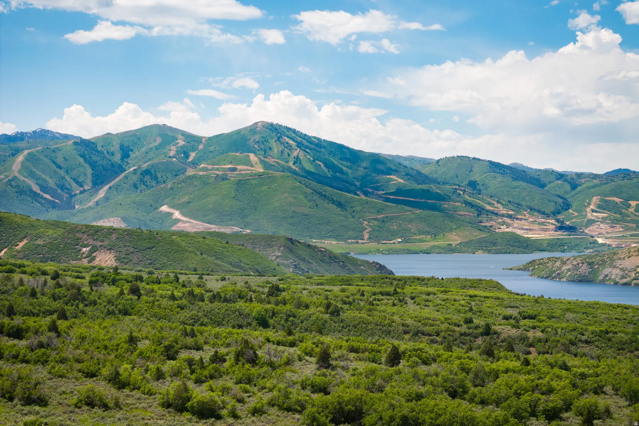 View of mountain background with a nearby body of water