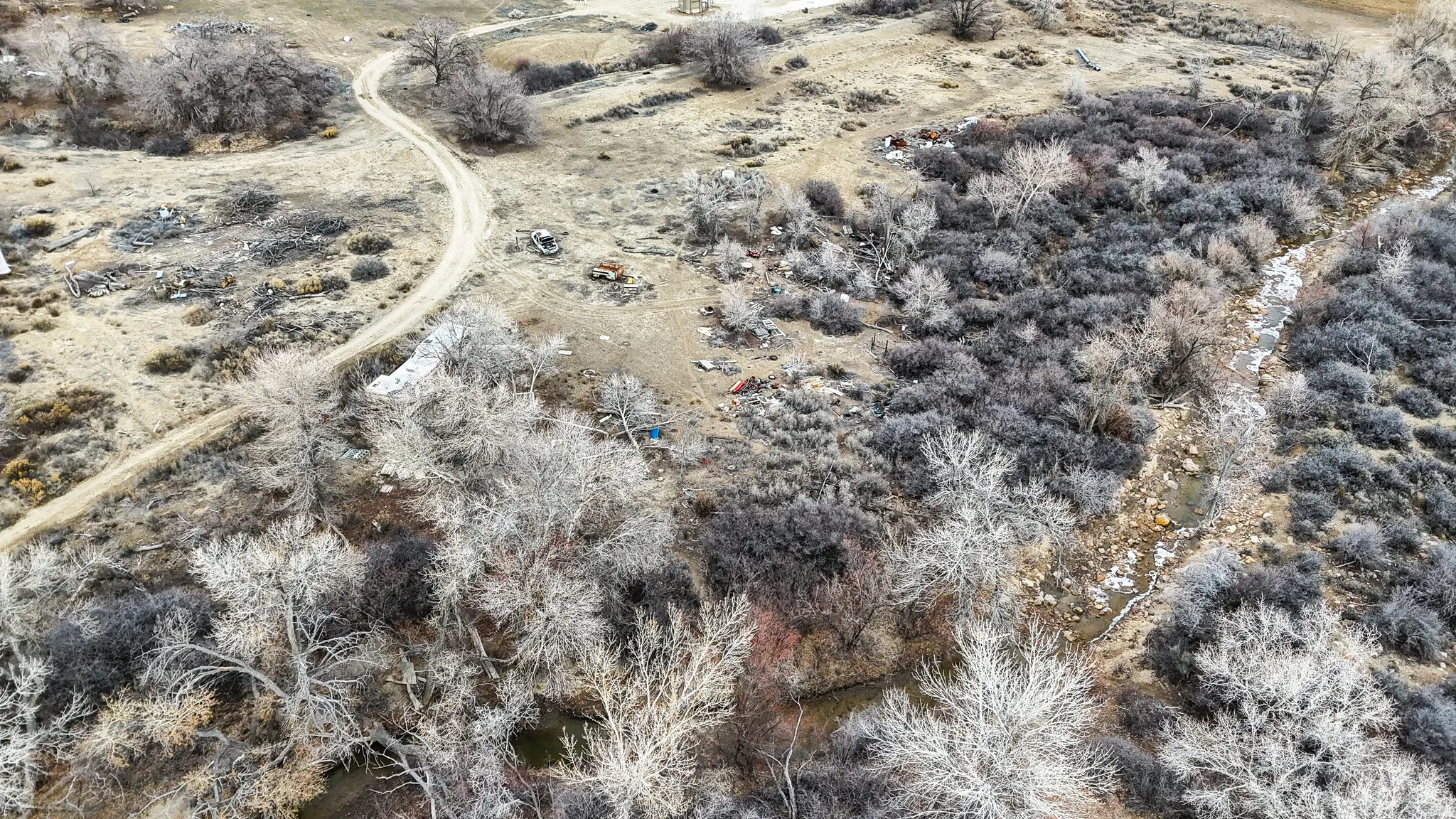 Overview of rural landscape with creek.
