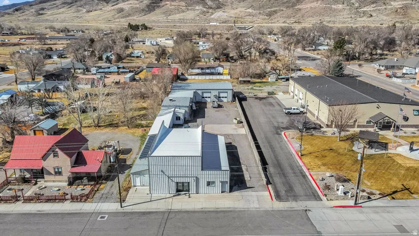 Aerial view of residential area with a mountain backdrop