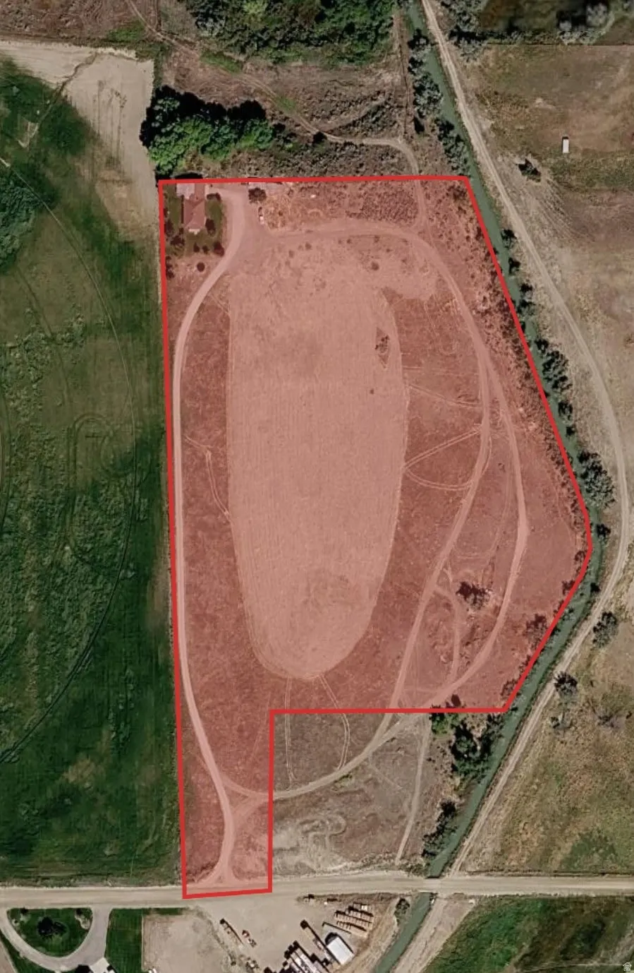 Aerial Property View. Displaying the property boundary and land features