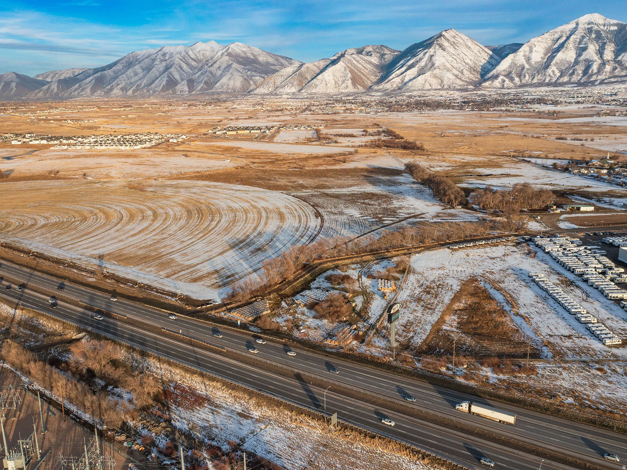 View of mountain background featuring rural landscape