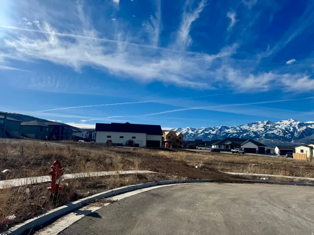 View of yard featuring a mountain view and a residential view