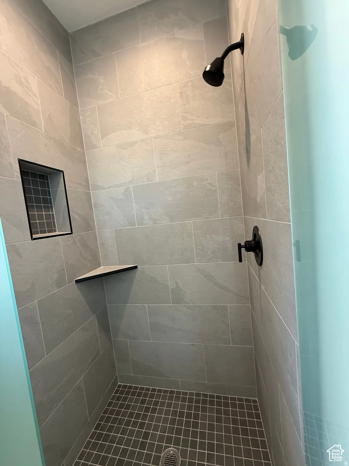 Full bathroom with a stall shower