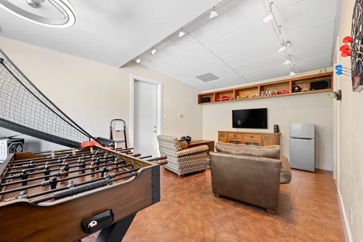 Recreation room with rail lighting