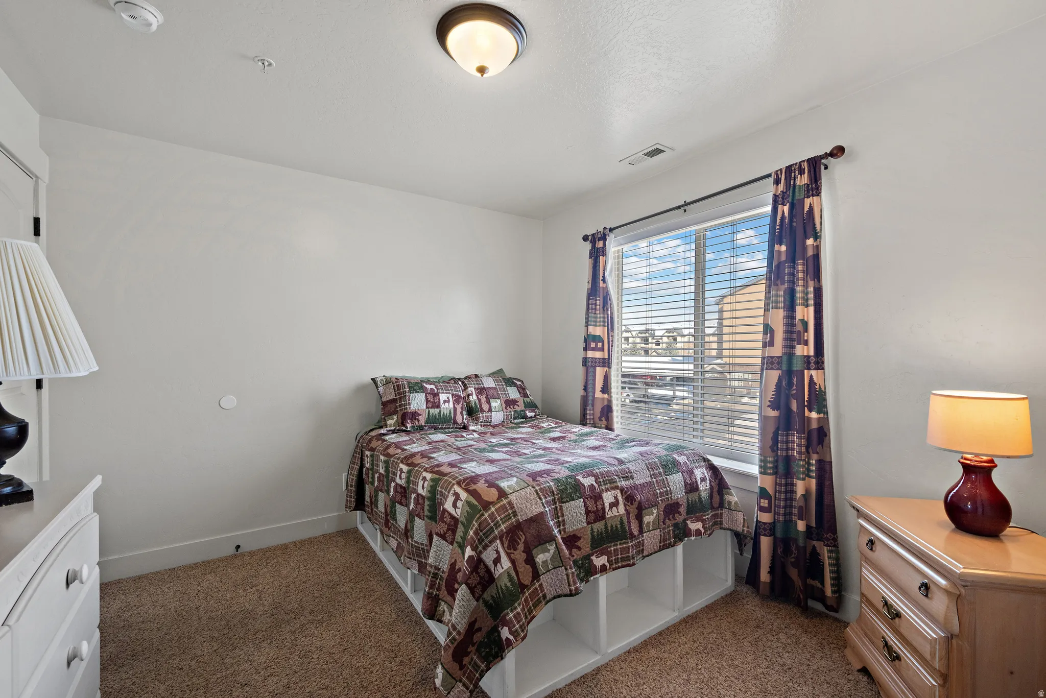 Bedroom with carpet