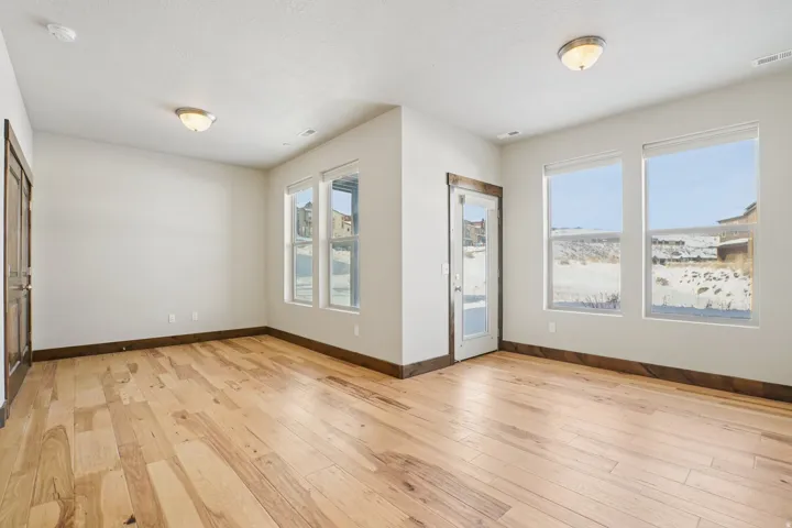 Unfurnished room featuring light wood-style floors