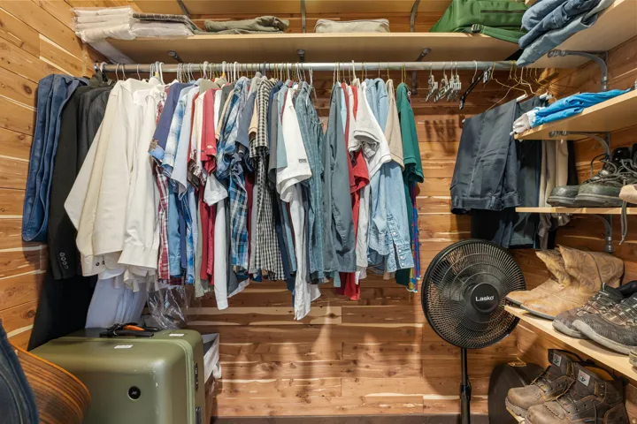 Walk in closet featuring hardwood / wood-style floors