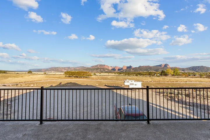 View of patio / terrace with a mountain view and a view of rural / pastoral area