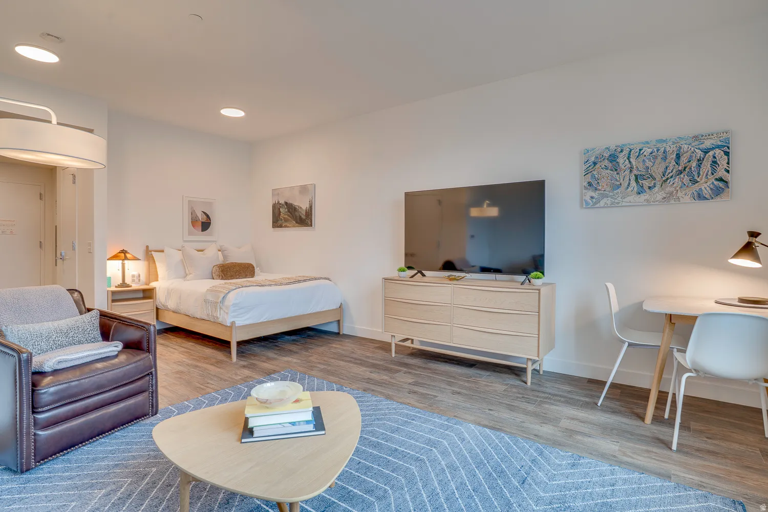 Bedroom featuring wood finished floors and recessed lighting