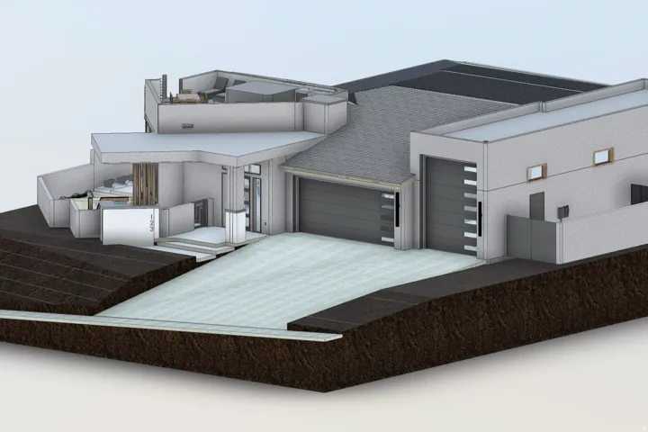 View of front of home featuring an attached garage and driveway