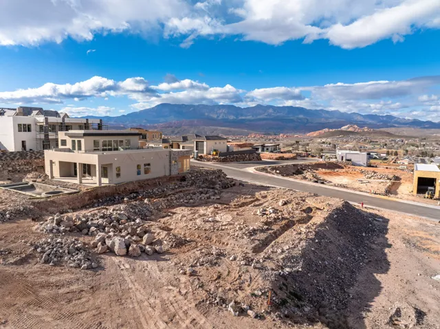 View of mountain background featuring nearby suburban area