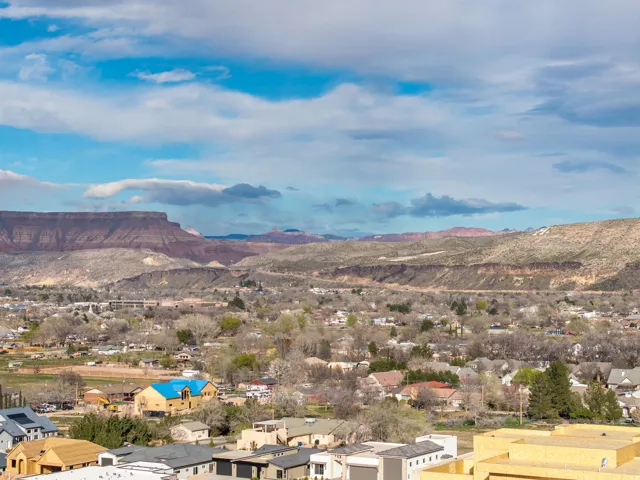 View of mountain background featuring nearby suburban area