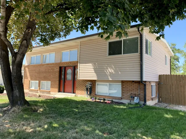 View of front of home featuring brick siding