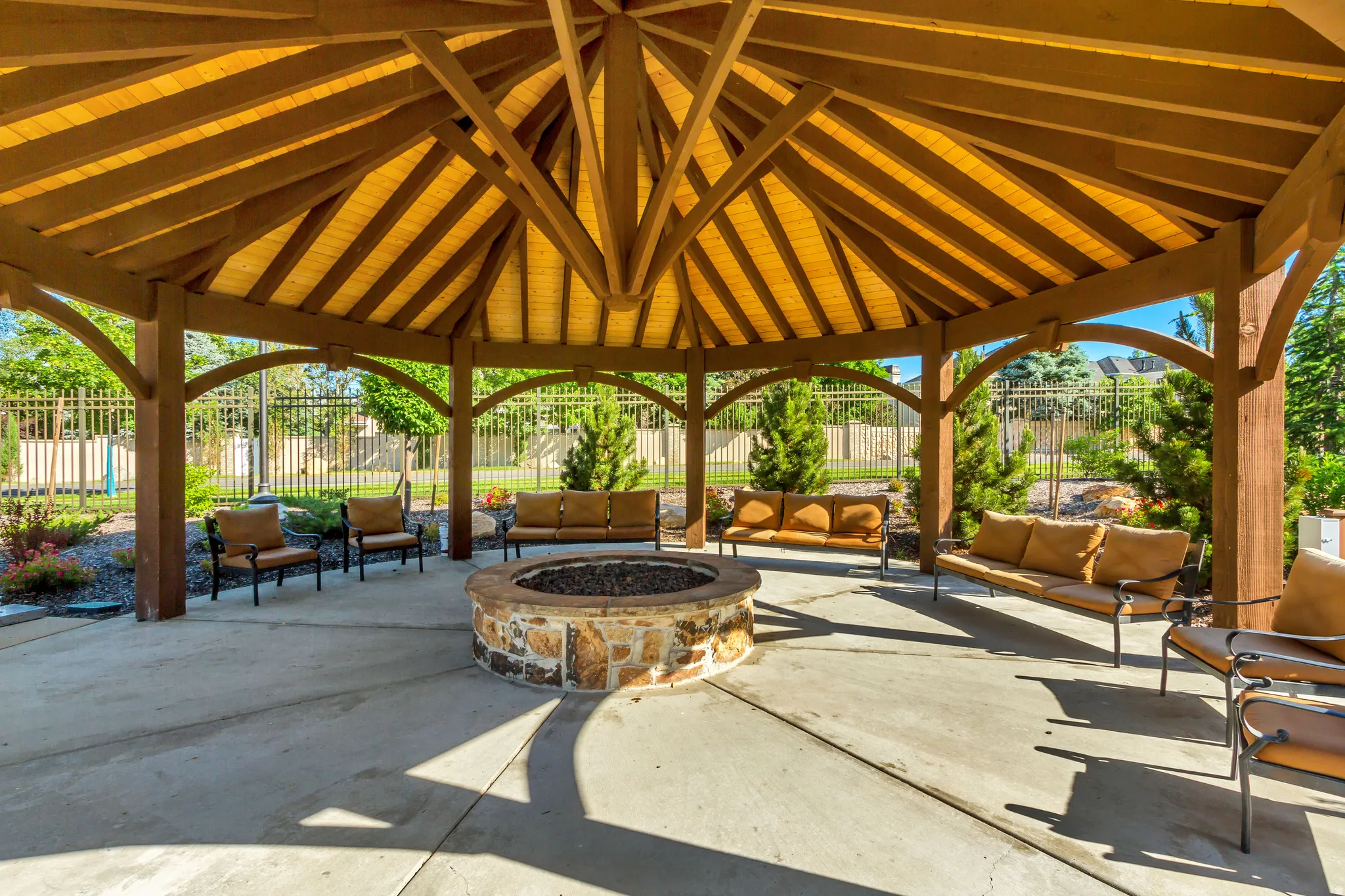 View of patio with an outdoor living space with a fire pit
