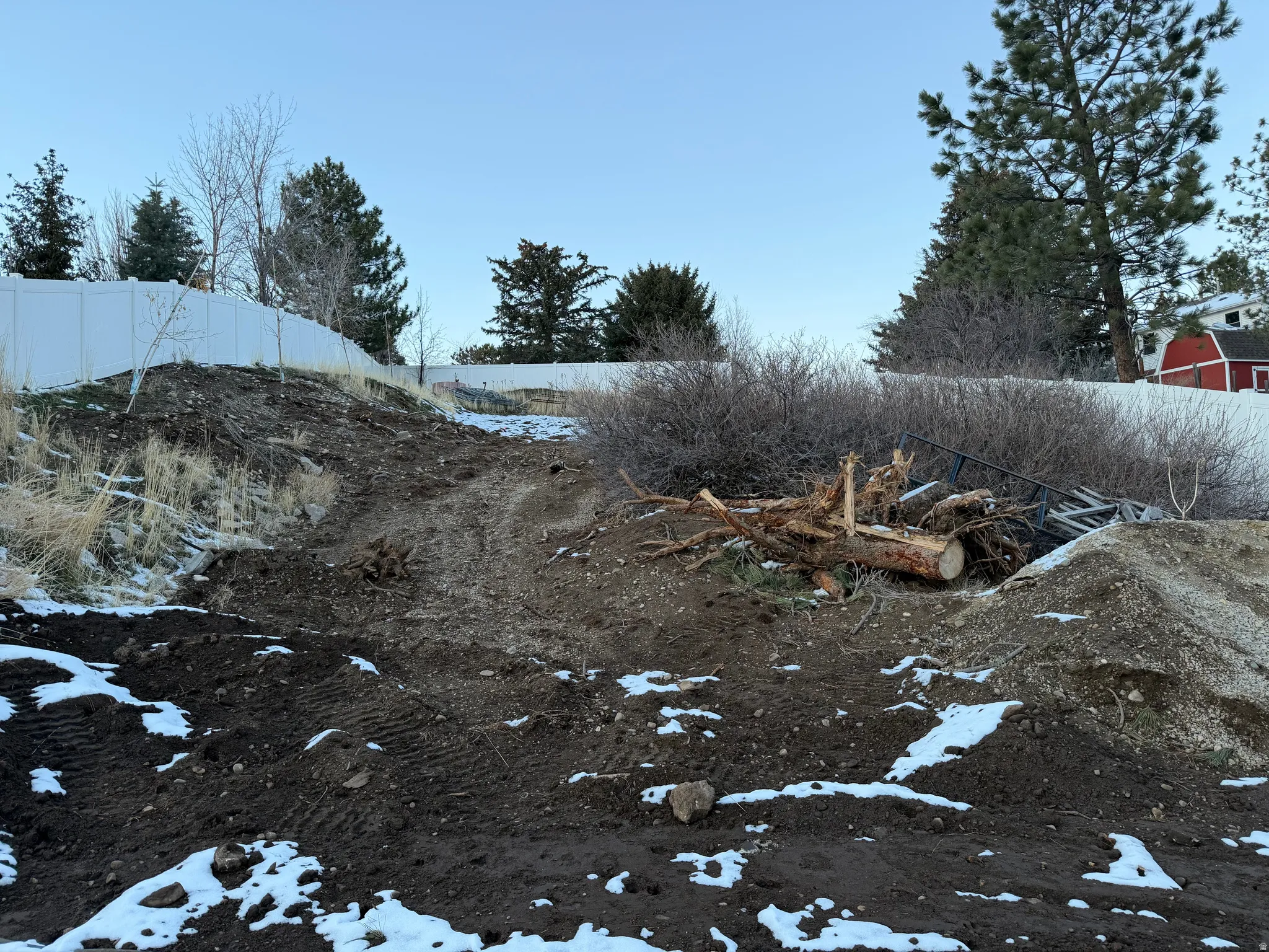 View of yard covered in snow