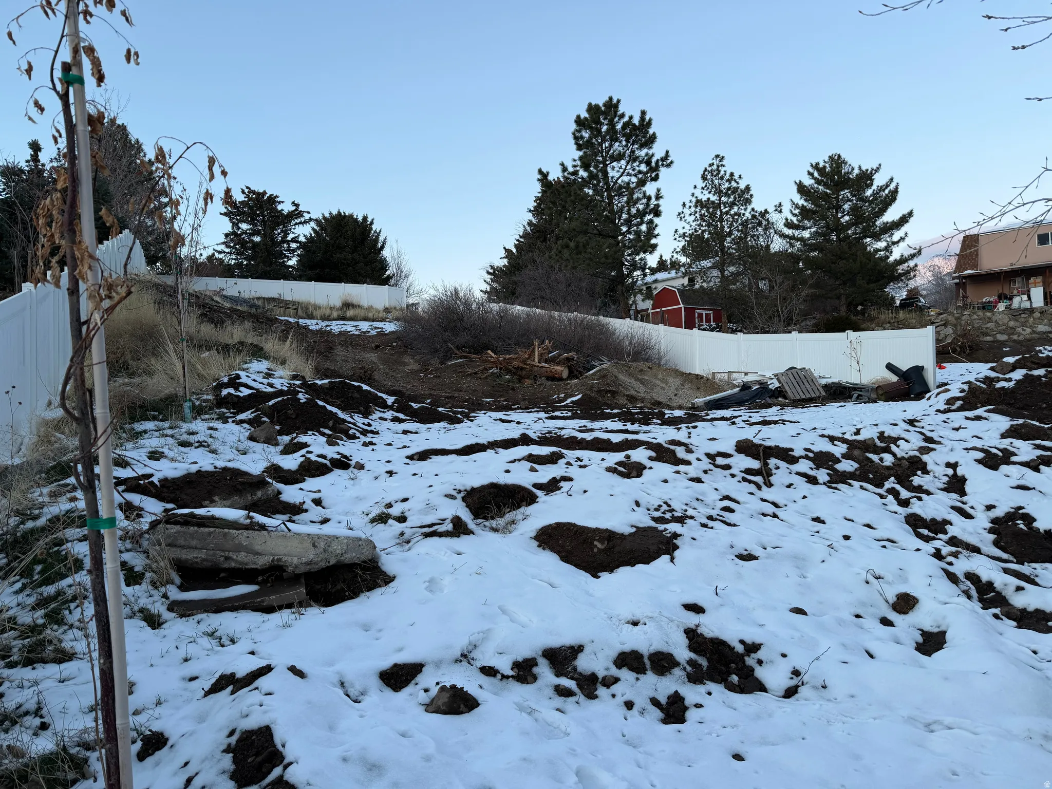 View of yard covered in snow