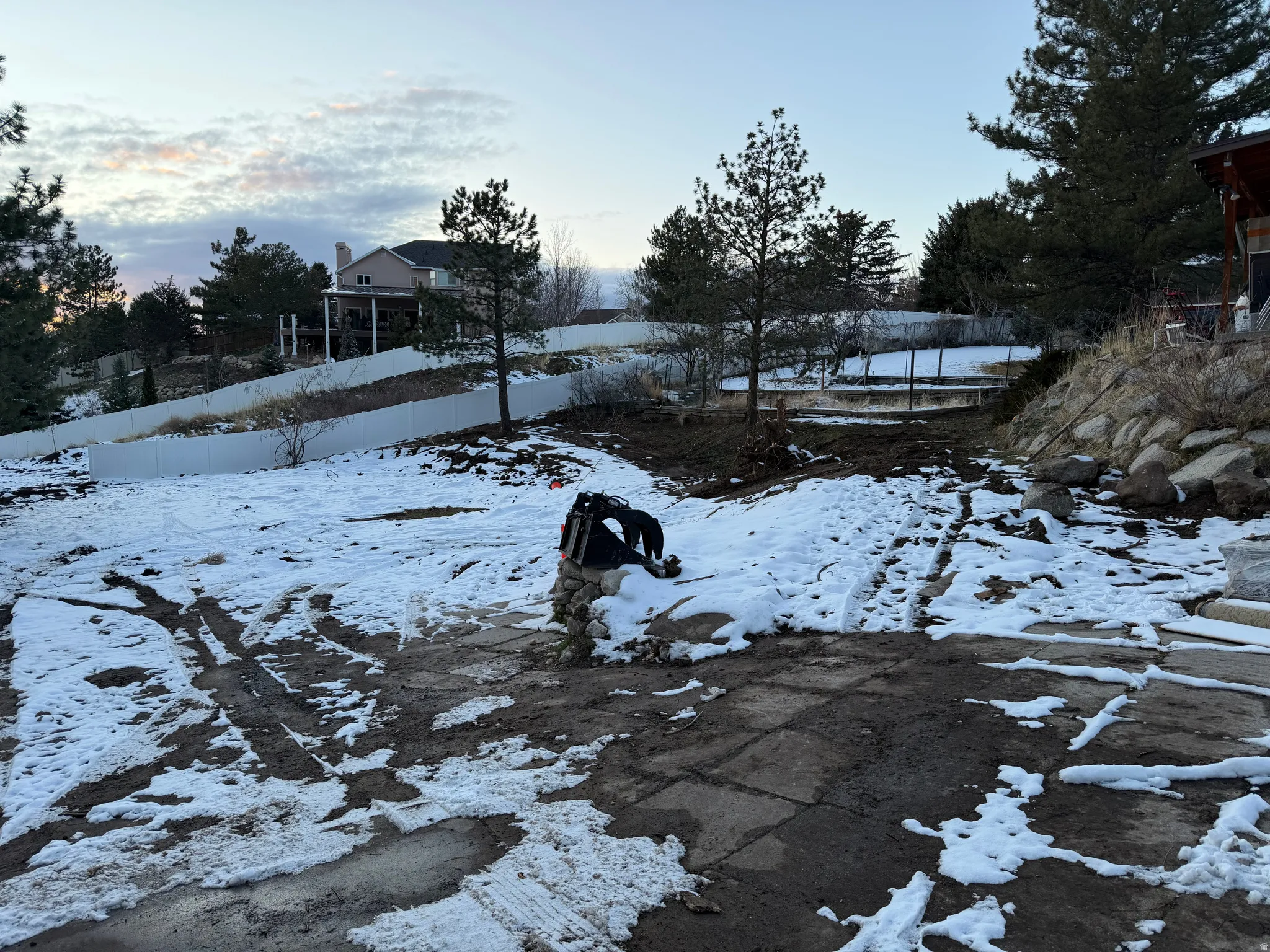 View of yard covered in snow