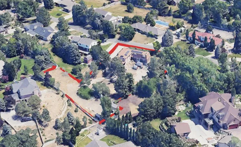 View of property location featuring nearby suburban area