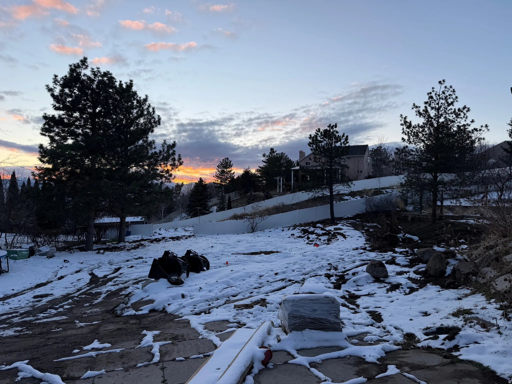 View of yard covered in snow