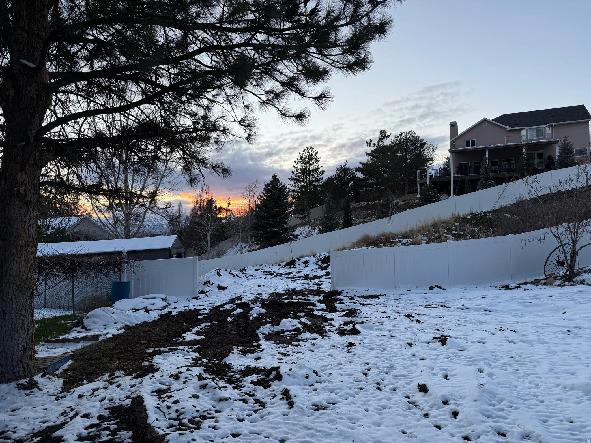 View of yard layered in snow