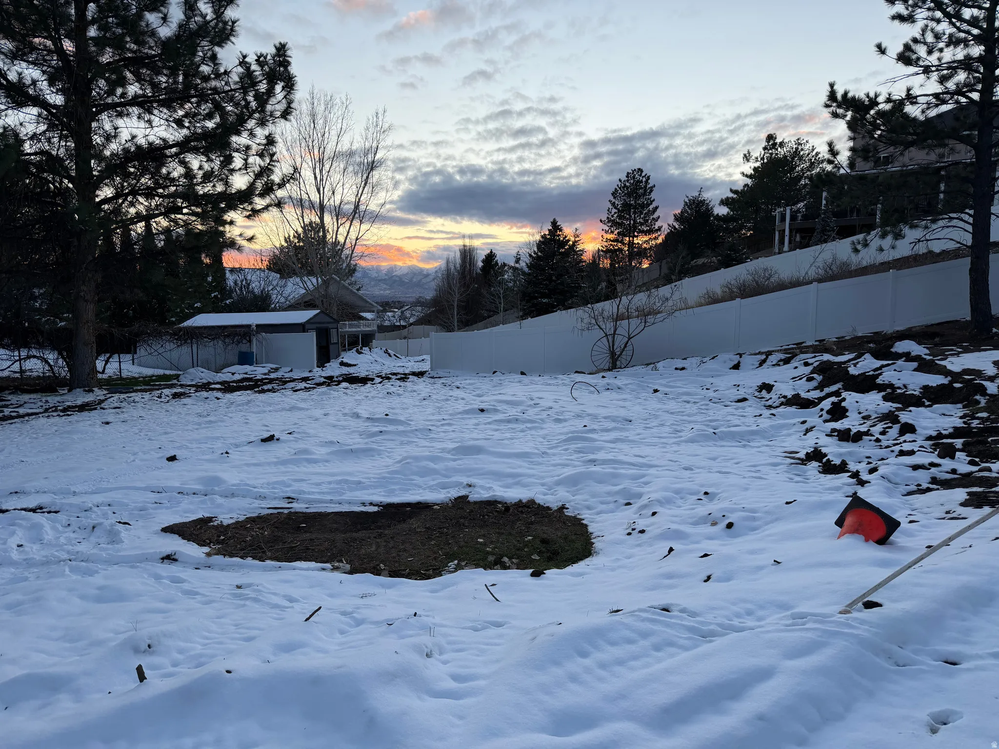 View of yard layered in snow
